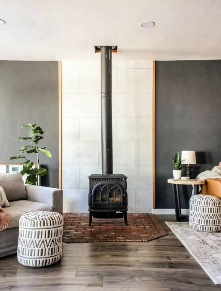 Faux Concrete Wall Panels Behind Fireplace